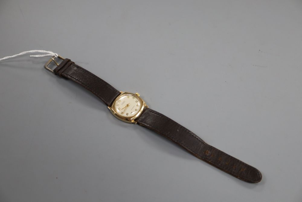 A gentlemans 1960s 9ct gold Lanco manual wind wrist watch, on leather strap.